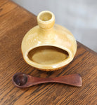 Pottery salt pig and spoon